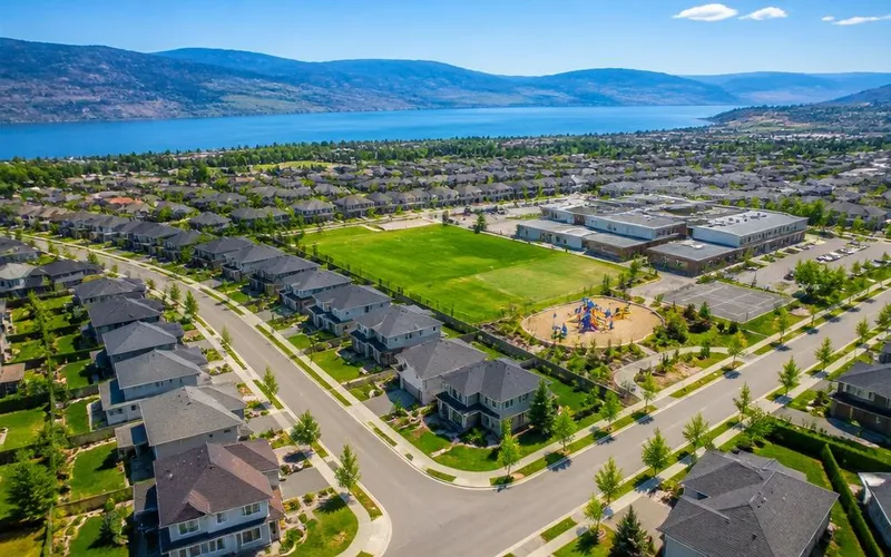 Aerial view of Glenmore in Kelowna, BC — family homes near top schools, playgrounds, and Okanagan Lake