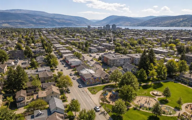 Aerial view of Rutland in Kelowna, BC — diverse community homes, local shops, and a neighbourhood park